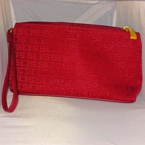 SL Fashions red cosmetic bag